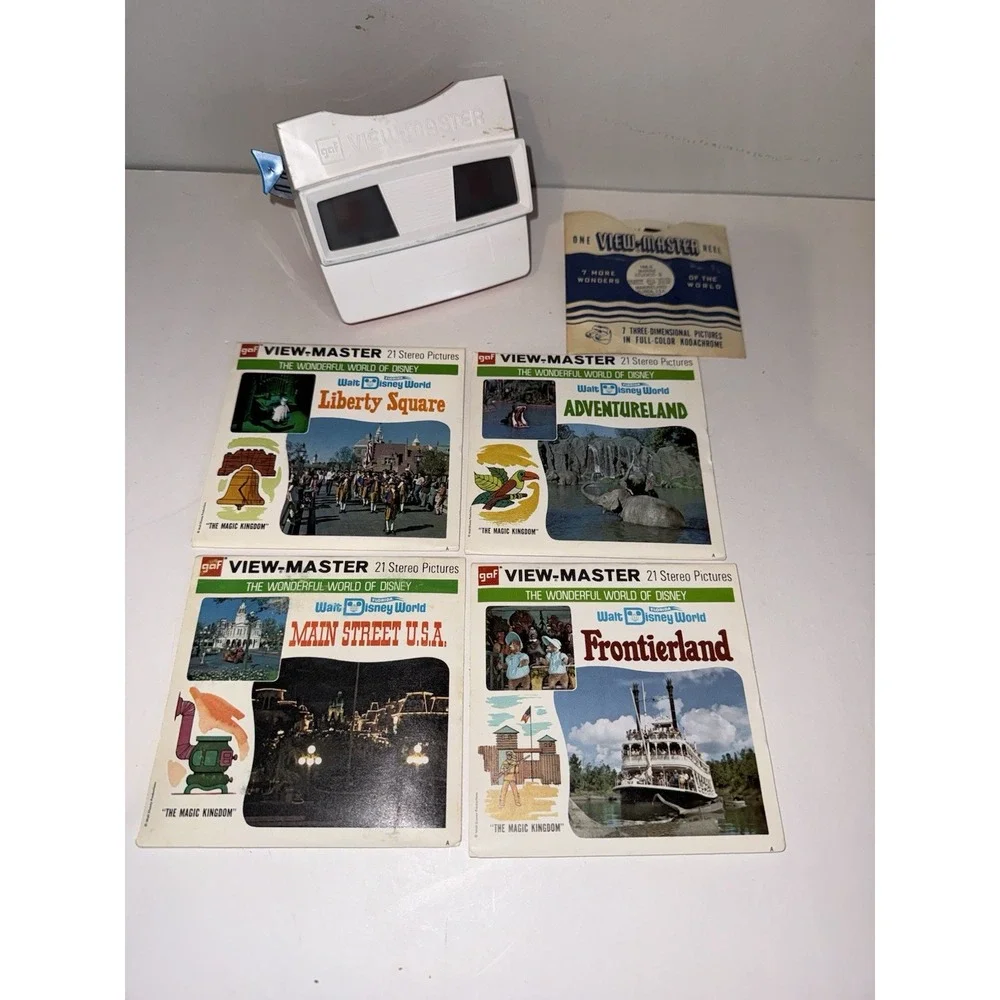 VTG Red/white View Master With 4 Magic kingdom Land Reels